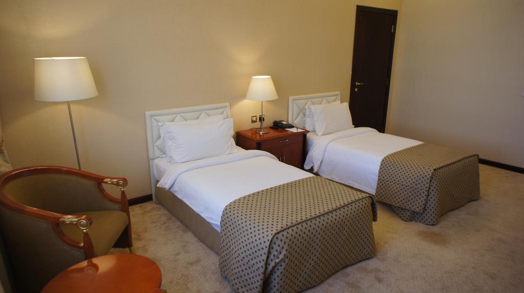 Gloria Hotel Doha Zimmer foto