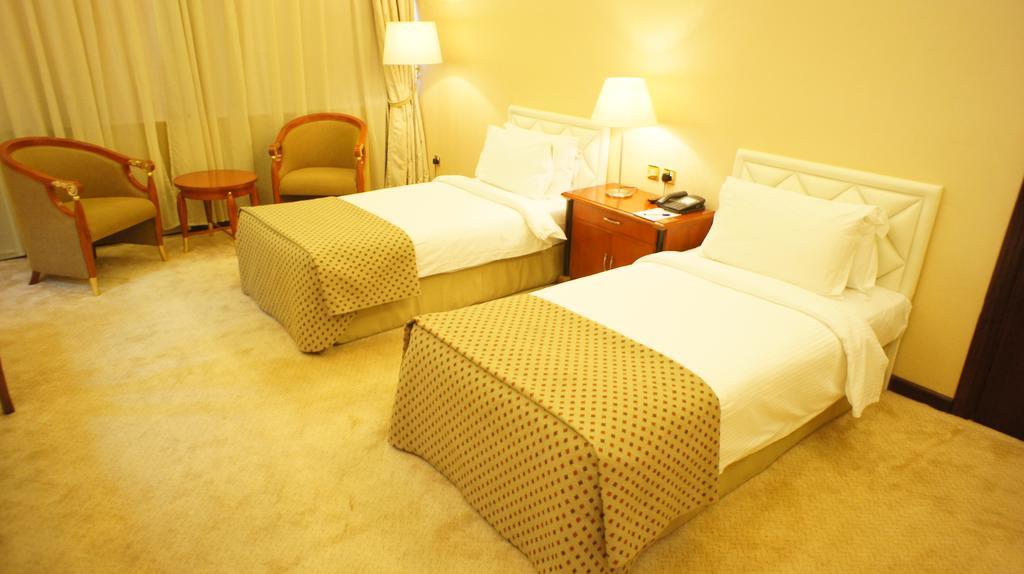 Gloria Hotel Doha Zimmer foto